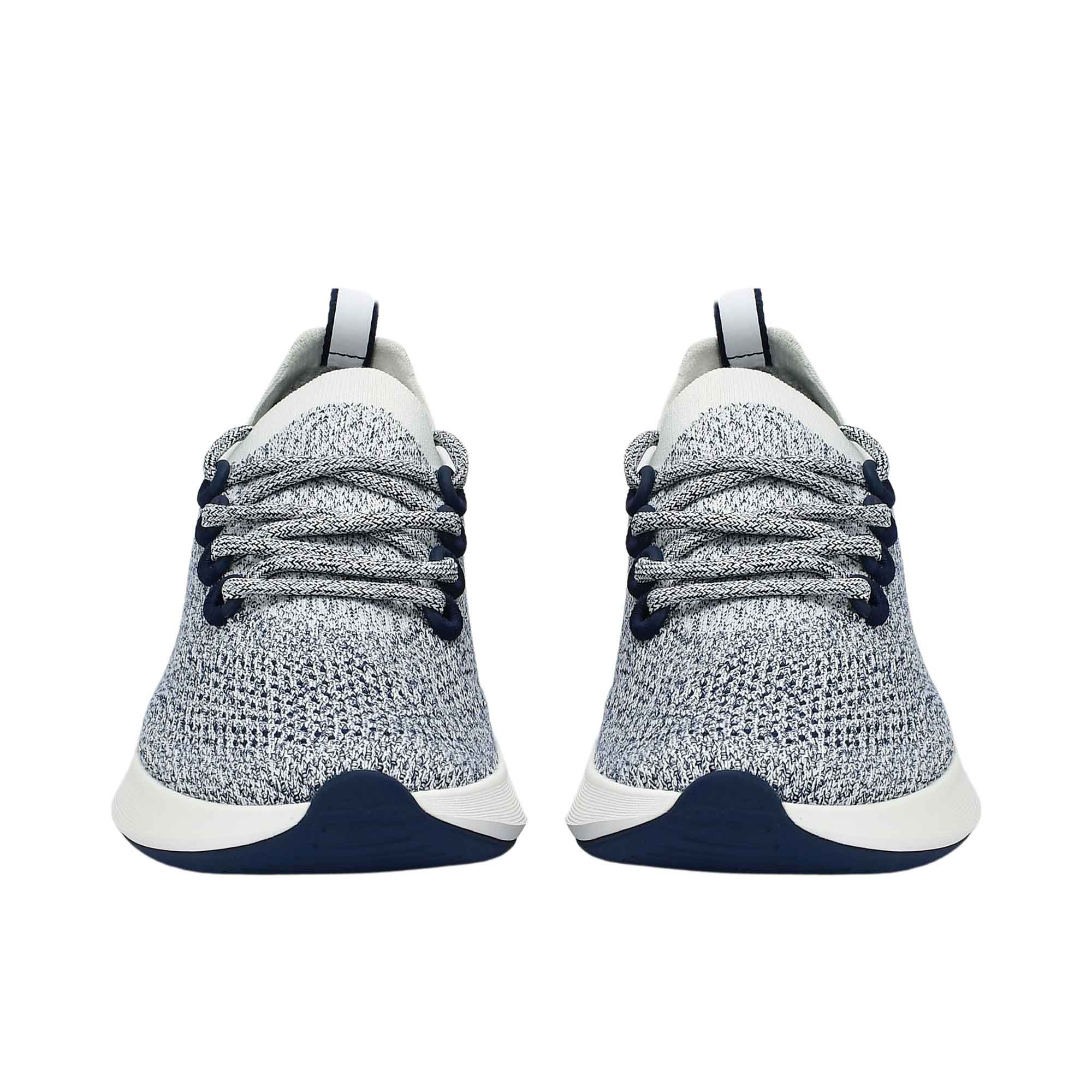 Front-facing view of a pair of Allbirds Tree Dasher 2 running shoes, showing the textured toe boxes and mixed navy-white patterned laces.