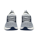 Front-facing view of a pair of Allbirds Tree Dasher 2 running shoes, showing the textured toe boxes and mixed navy-white patterned laces.