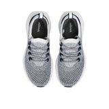 Top-down overhead view of the navy and white sneakers, displaying the dark grey insoles printed with the white Allbirds logo.