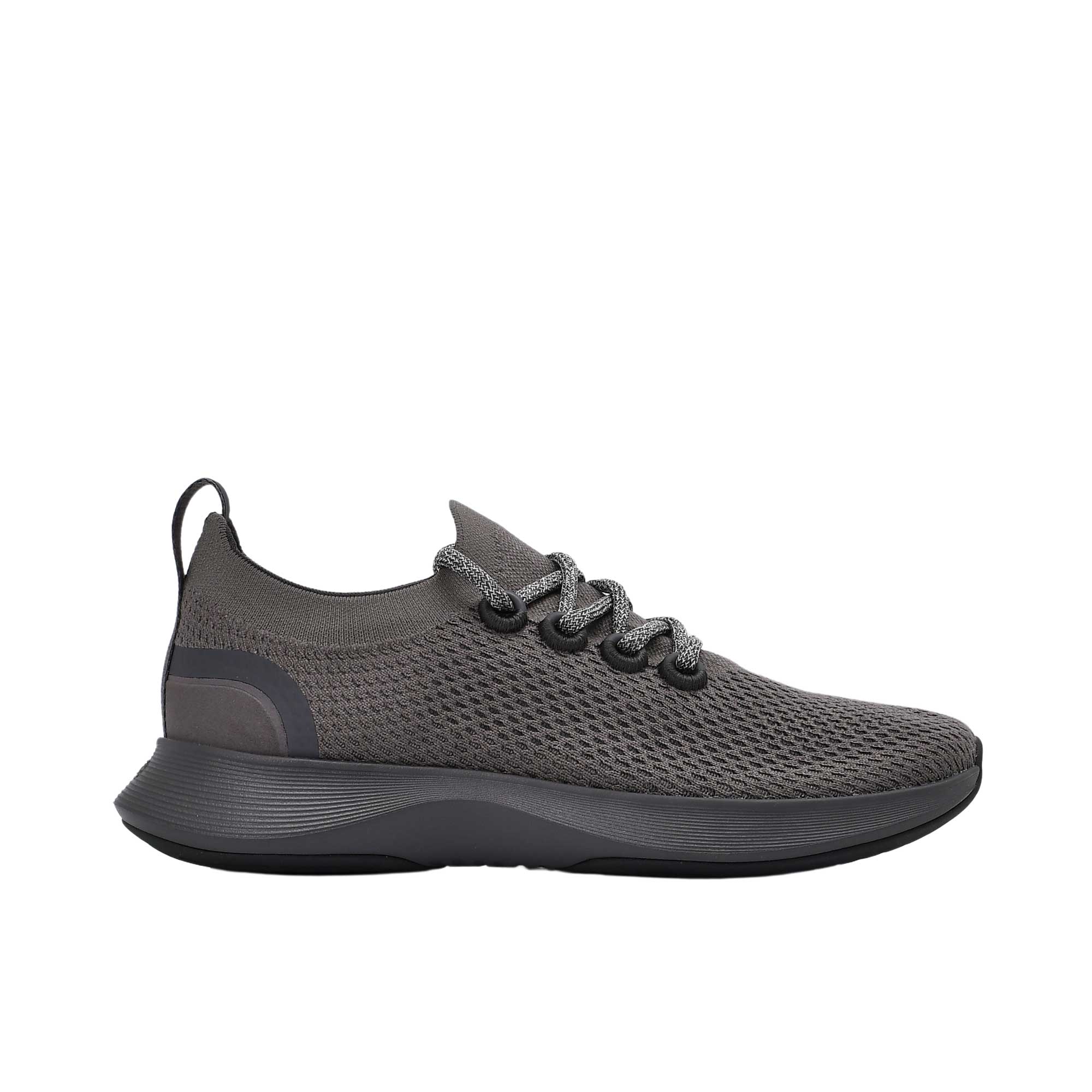 Profile view of a single charcoal grey Allbirds Tree Dasher 2 sneaker, showcasing its breathable knit upper, patterned laces, and thick dark grey midsole.