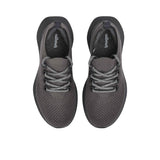 Top-down overhead view of the sneakers displaying the matching dark insoles printed with the white Allbirds logo.