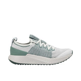 Profile view of a single Allbirds Tree Flyer running shoe featuring a white knit upper, sage green midfoot and heel accents, and a thick, textured off-white midsole.