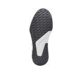 Close-up of a shoe sole with black and white design on a white background.