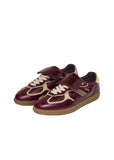 A pair of deep burgundy ALOHAS TB.490 Club Onix sneakers showing the textured woven panels, cream laces, and signature oversized tongue detail.