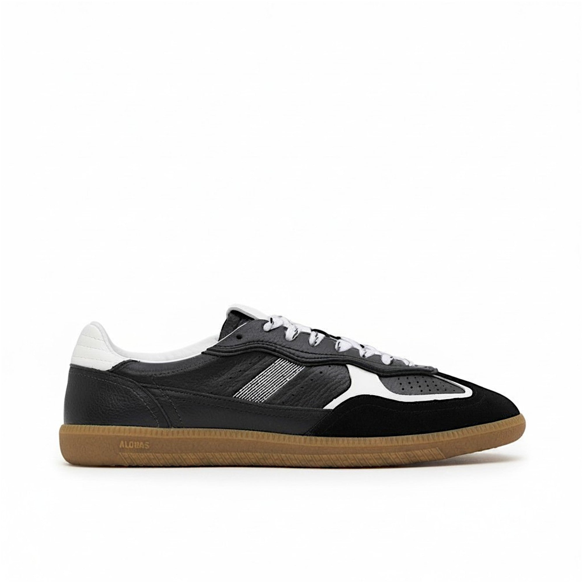 Black sneaker with white accents on a white background.