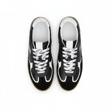 Black sneakers with white laces on a white background.