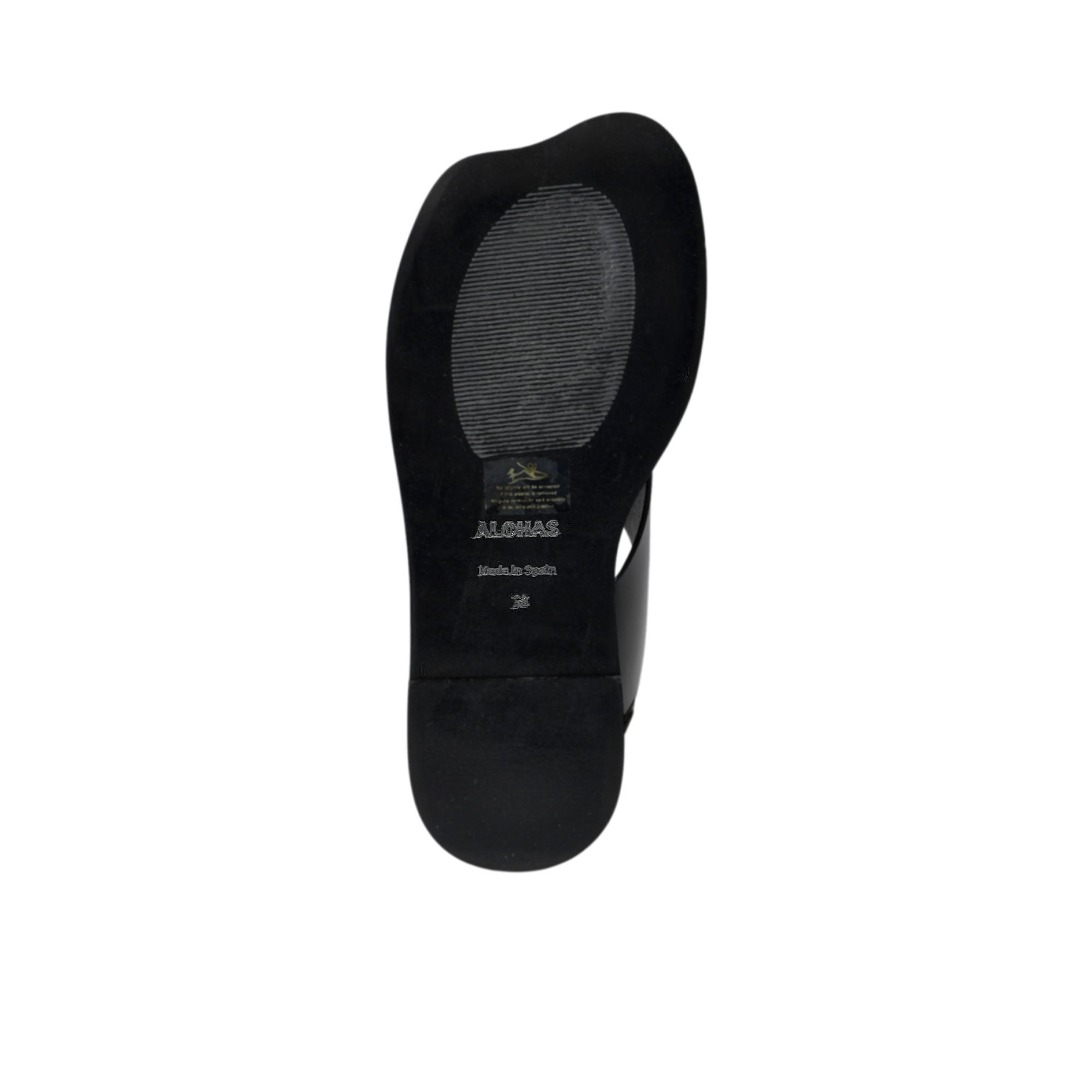 Bottom view of the black outsole of an ALOHAS sandal, featuring the debossed brand name, "Made in Spain" , stamp, and a textured non-slip pad.