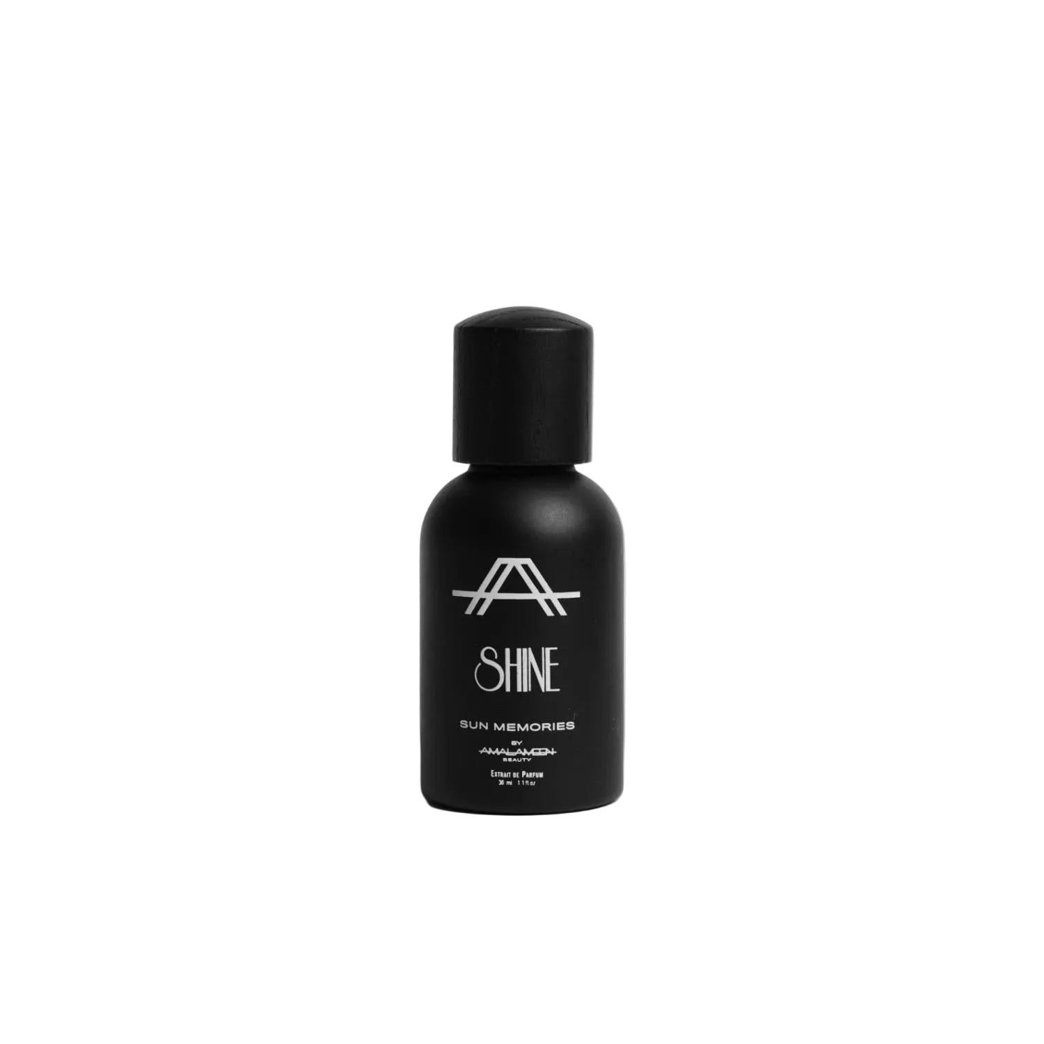 Studio product photograph of the Amal Ameen Beauty Silk Velvet Night Hair Mist 30ml bottle, featuring a sleek black cylindrical canister with silver branding text over a clean grey background.