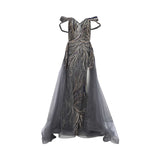 Front view of a mauve Andrea & Leo Couture mermaid gown featuring ornate silver beadwork and a flared tulle hem.