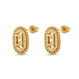 An angled perspective shot of the oval luxury logo earrings, highlighting the polished thickness of the gold plating and the protruding secure ear posts.