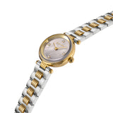 An angled close-up profile photograph of the Escada Scarlett watch emphasizing the polished yellow gold case edge, the fluted crown, the clear crystal face, and the clean multi-link architecture of the mixed-metal band.