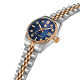 An angled close-up view of the Guy Laroche Rose timepiece, showing the polished finish of the integrated lugs, the signed rose gold setting crown, and the fluid drape of the multi-link metallic band.