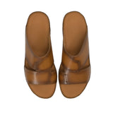 Direct top-down view of a pair of Antonio sandals showing the smooth tan leather insoles cleanly debossed with the Antonio brand name and Hand Made in Italy script against a white background.