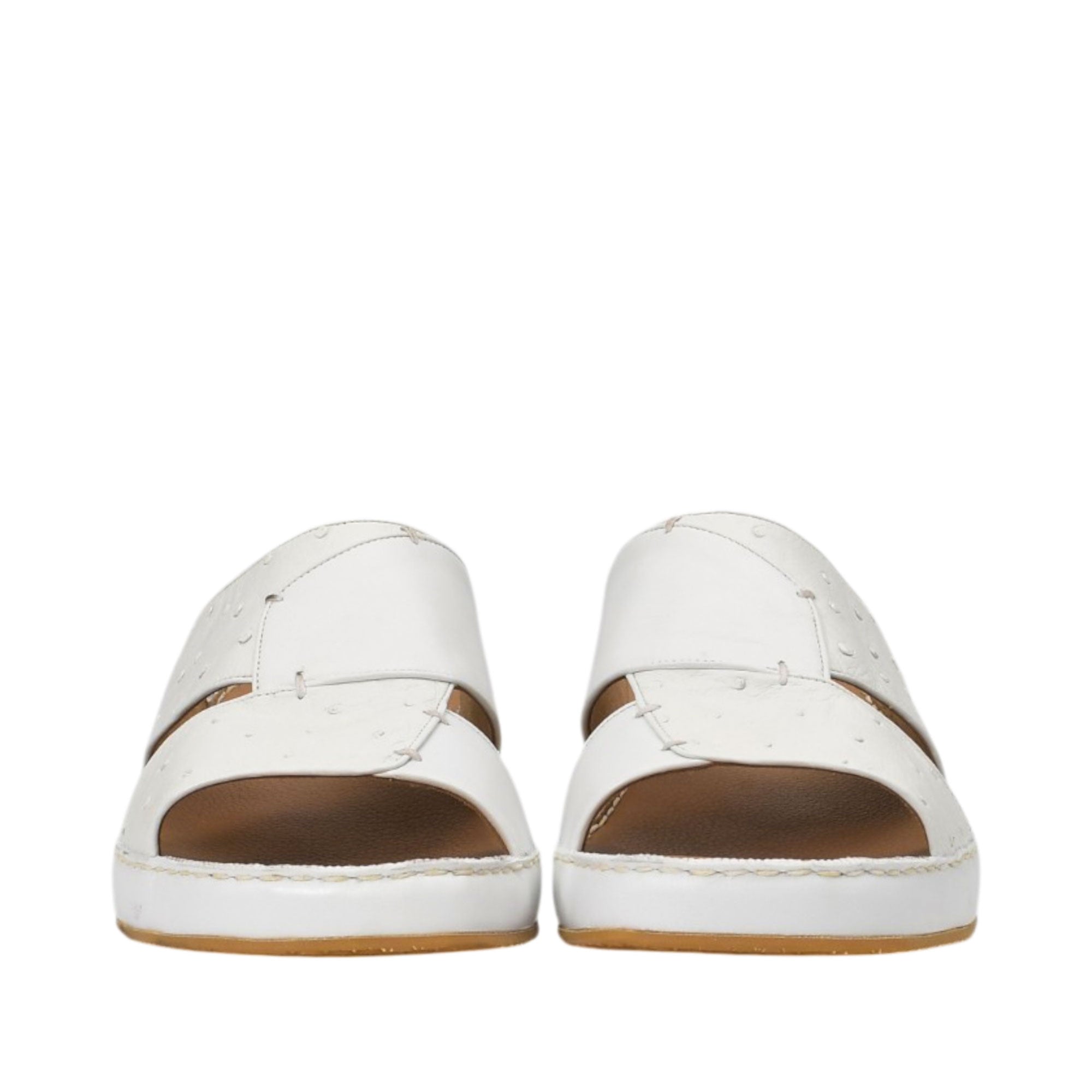 Front view of a pair of Antonio white Arabic sandals, highlighting the dual overlapping straps with contrasting textures and fine accent stitching against a white background.
