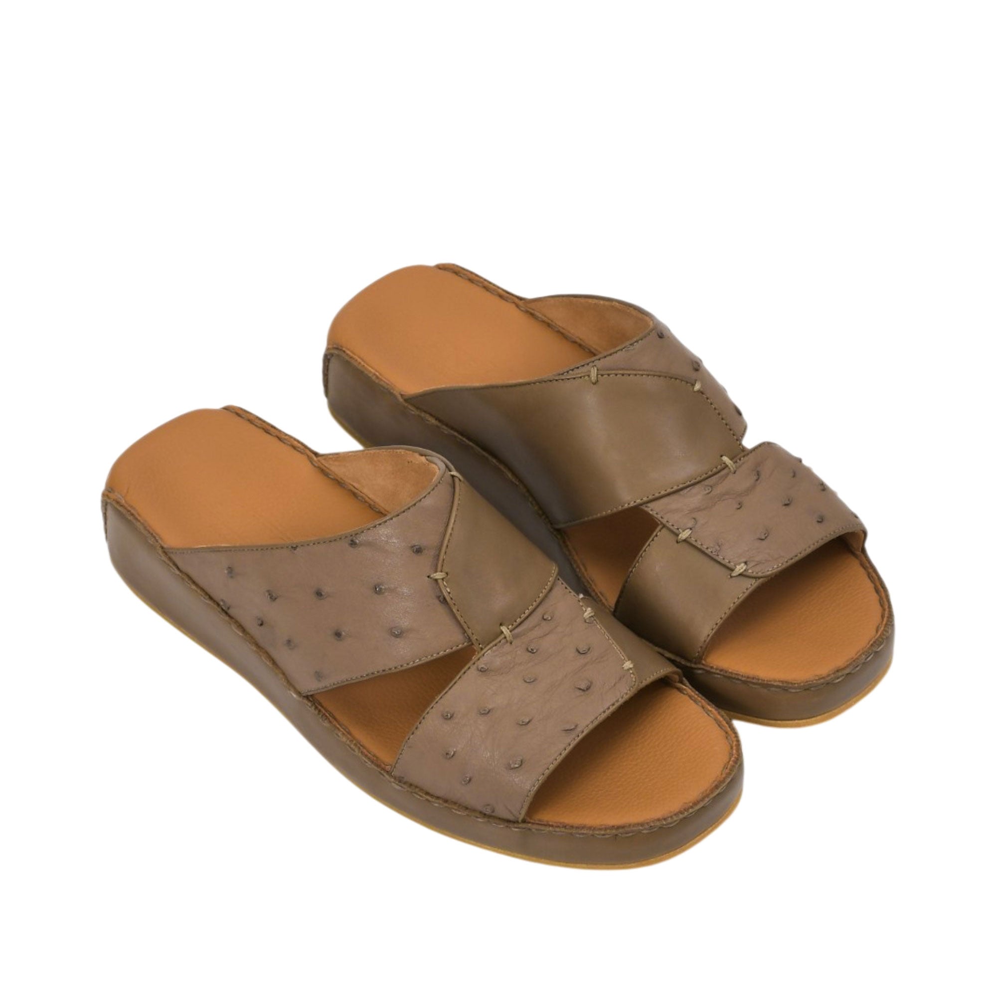 An overhead three-quarter angle view of a pair of Antonio khaki leather sandals, demonstrating the rich blend of smooth and ostrich-textured finishes against a white background.