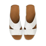 Direct top-down view of a pair of Antonio sandals showing the smooth tan leather insoles debossed with the Antonio logo and 'Made in Italy' emblem against a white background.