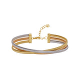 Three-strand tubogas bangle with gold-toned, rose gold-toned, and silver-toned finishes, featuring a gold-toned lobster clasp
