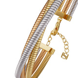 Threetone tubogas bangle with silver-toned, gold-toned, and rose-gold-toned. Gold-toned lobster clasp, extender chain, and SH