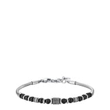Men's silver-toned steel bracelet with black spherical beads and a textured central barrel element, featuring a lobster clasp