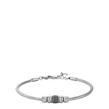 Silver-toned steel snake chain bracelet with a black enamel central element and textured cylindrical beads.