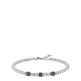 Silver-toned steel bracelet with small round beads and three square black hematite beads spaced along the front. Lobster clas