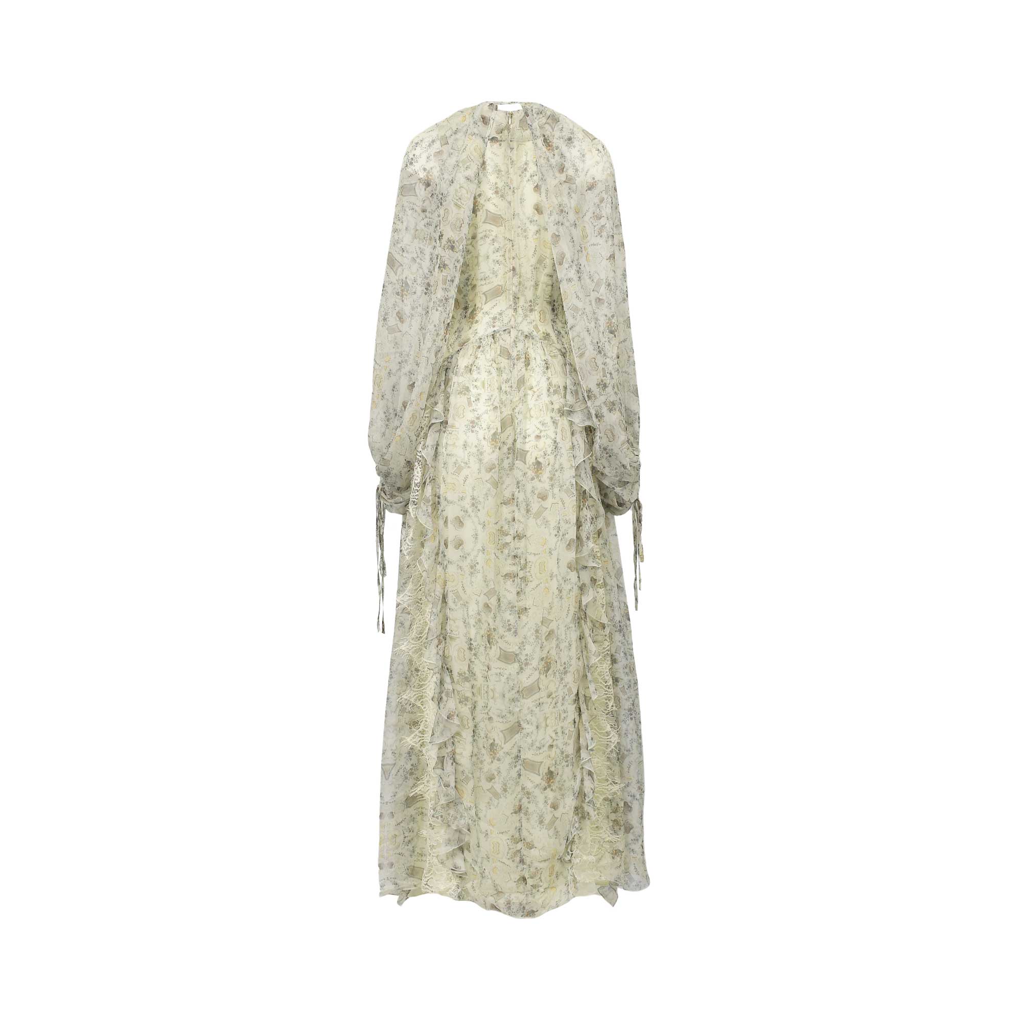 Back view of a pale floral sheer maxi dress with long gathered sleeves, ties at cuffs, and vertical ruffles down the skirt.