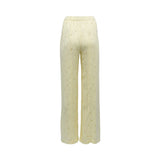 BAQA pale yellow satin wide-leg trousers with a subtle polka-dot pattern and an elasticated drawstring waist.
