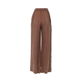 Back view of BAQA cinnamon trousers showing the elasticated waistband and relaxed wide-leg drape