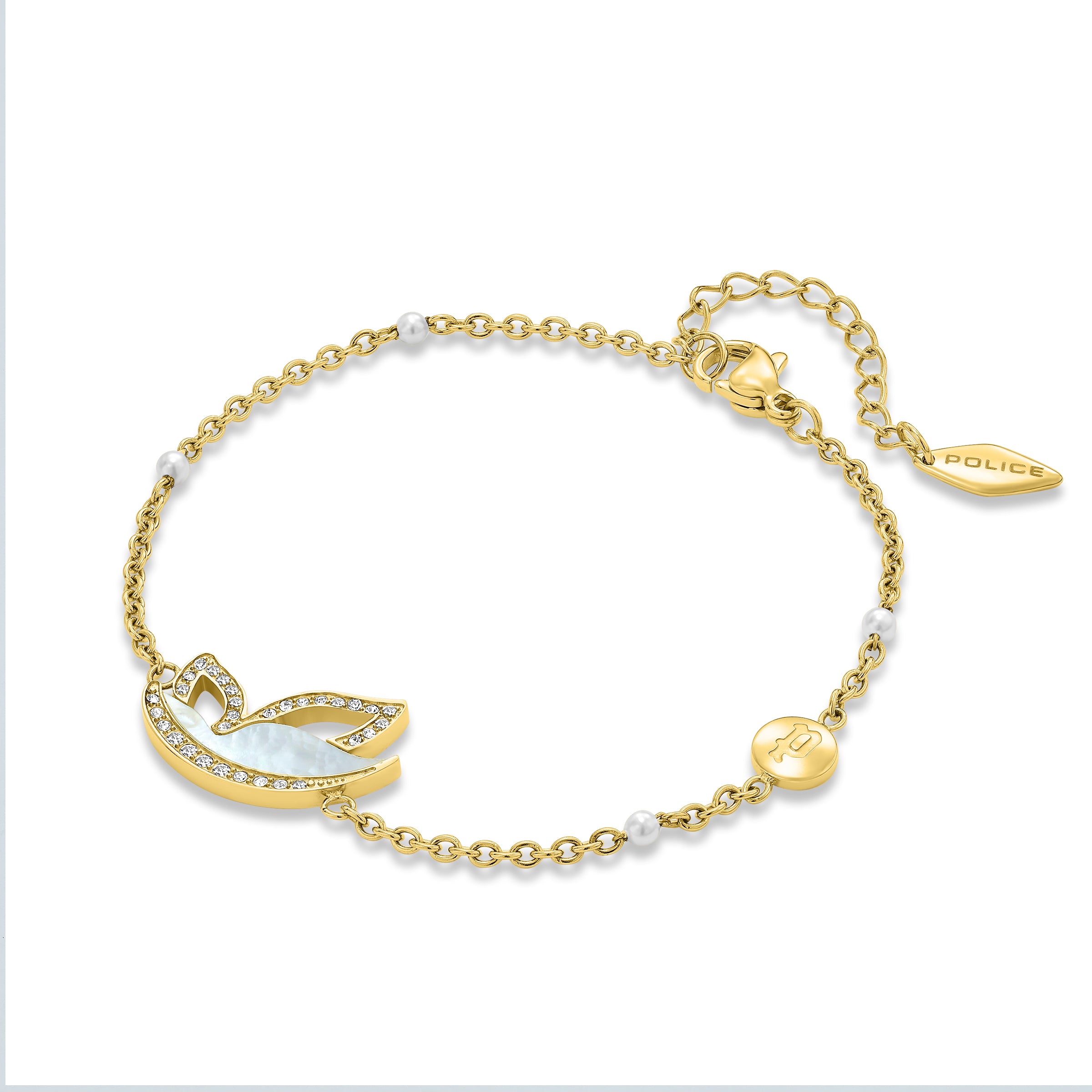 Gold-toned chain bracelet with a white mother-of-pearl bird charm outlined in clear crystals, and white pearl beads.