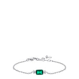 Silver-toned chain bracelet with a central rectangular green zircon flanked by two clusters of white zircons. Lobster clasp.