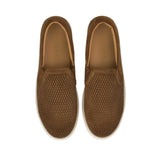 Direct top-down view of a pair of Baldinini slip-on sneakers showing the tan leather insoles debossed with the Baldinini logo, framed by the symmetrical brown woven suede uppers against a white background.