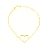Gold-toned metal bracelet with a central open heart charm, fine curb chain, lobster clasp, and extender chain.