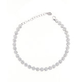 Silver-toned bracelet featuring a continuous line of circular clusters, each adorned with clear faceted stones, a lobster cla