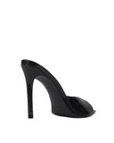 Rear-angle view of the GAIA Brea heel, showing the sleek stiletto construction and the handmade craftsmanship markings on the sole.