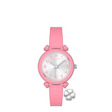 Pink silicone watch with a round silver-toned face, white numbers, pink heart lugs, and a silver-toned four-leaf clover charm