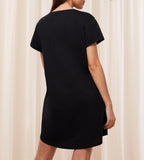 Back view of Model wearing the Triumph black short sleeve nightdress, showing the relaxed silhouette and soft-touch fabric. Available for Online Purchase