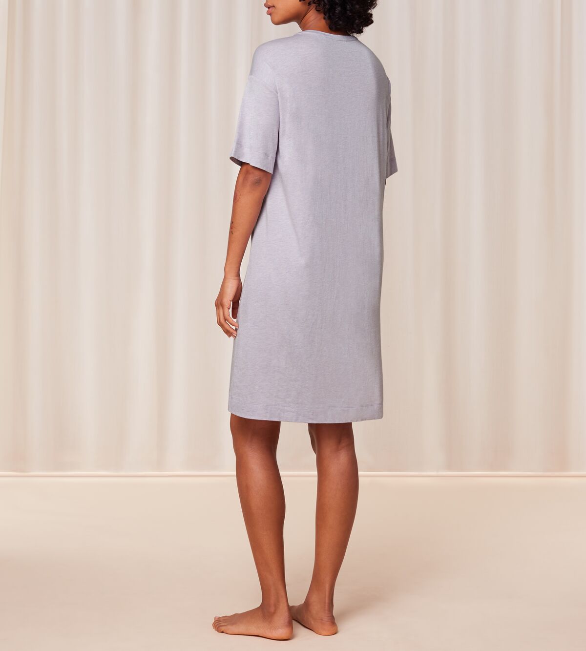 Back view of model wearing the Triumph light purple short sleeve nightdress, showing the relaxed fit and soft-touch jersey fabric. Order Online Today