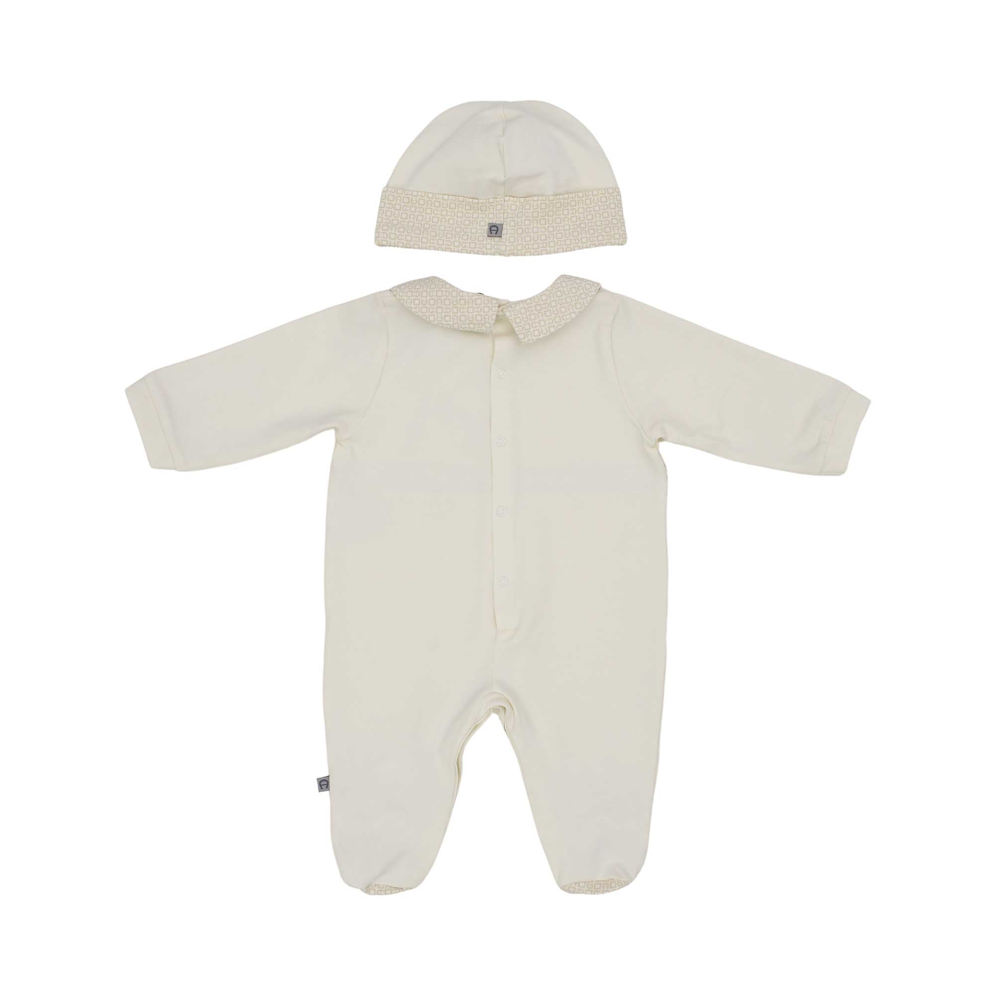 Back view of the Aigner newborn beige sleepsuit with monogram collar teddy motif and matching hat. Available for Online Purchase.