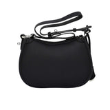 Back view of the Karisma Textured Leather Crossbody Bag in Black, showing the curved top and silver-tone hardware. Available Online