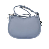 Back view of the Karisma Textured Leather Crossbody Bag in Blue, showing the curved top and silver-tone hardware. Available Online