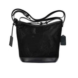 Back view of the Karisma black mesh leather crossbody bucket bag, featuring a geometric mesh pattern, adjustable crossbody strap, and signature logo tag. Shop Now Online