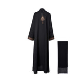 Back view of the Nero women's black embroidered abaya with Brown detailing and matching scarf. Shop the Latest Collection