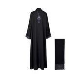 Back view of the Nero women's black embroidered abaya with nay and silver detailing and matching scarf. Shop the Latest Collection