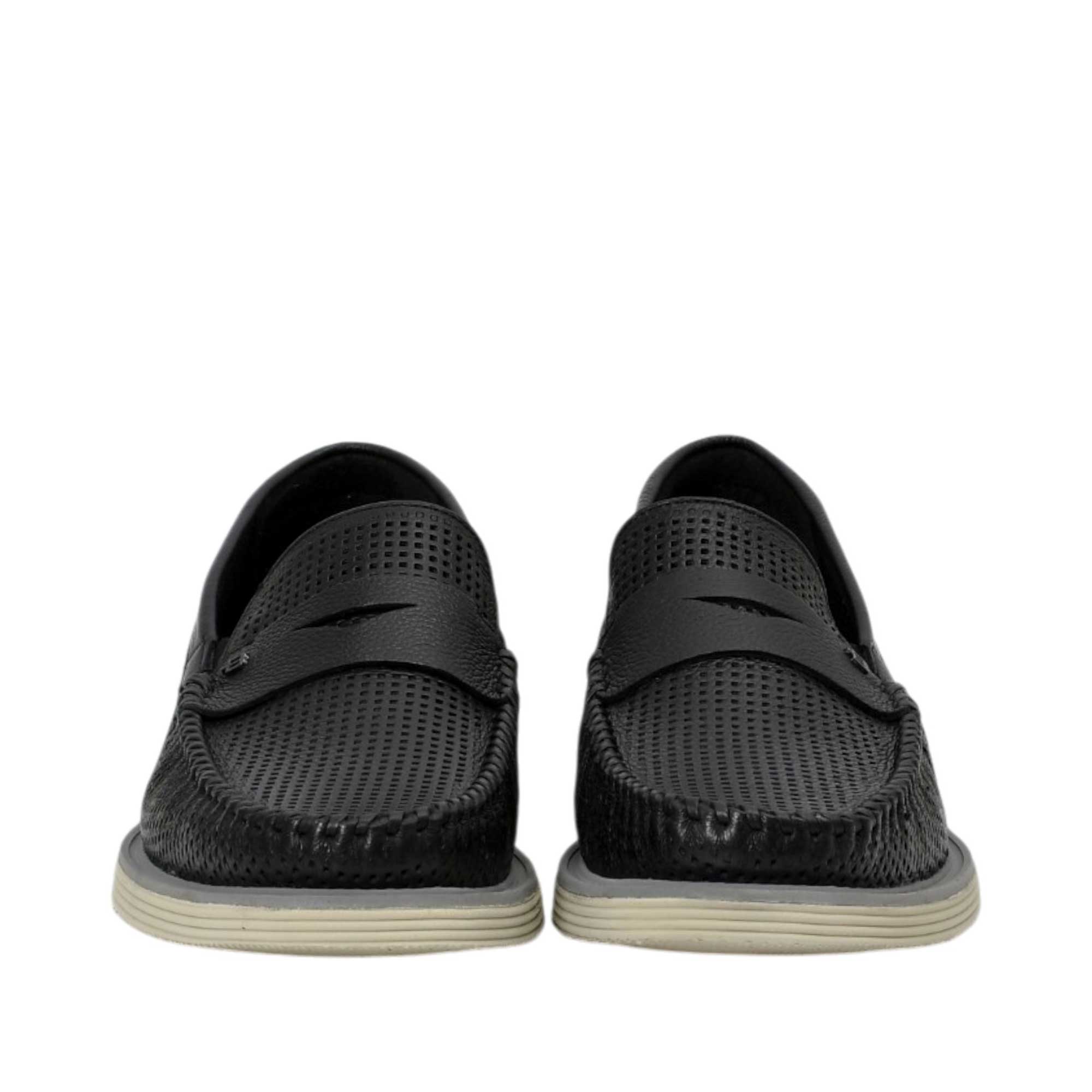 Front-facing view of a pair of Baldinini black leather loafers showcasing the symmetrical perforated texture, traditional penny straps, and sturdy stitched toe boxes against a white background.