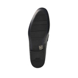 Bottom view of the Baldinini loafer showcasing the smooth black rubber outsole featuring a segmented tread pattern, debossed center sizing markers, and a prominent B logo stamped into the heel pad.
