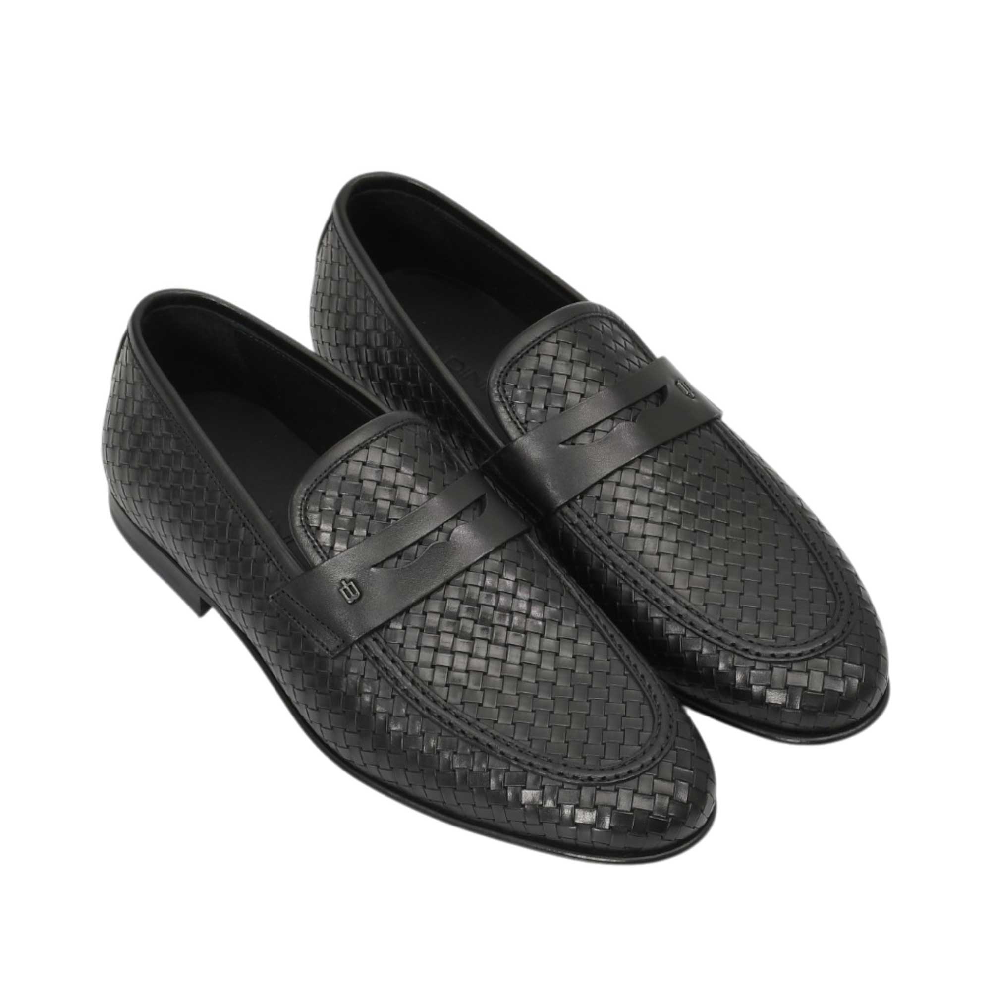 An overhead three-quarter angle view of a pair of Baldinini black woven loafers, displaying the intricate diamond-like leather texture and the subtle tonal logo on the penny strap against a white background.