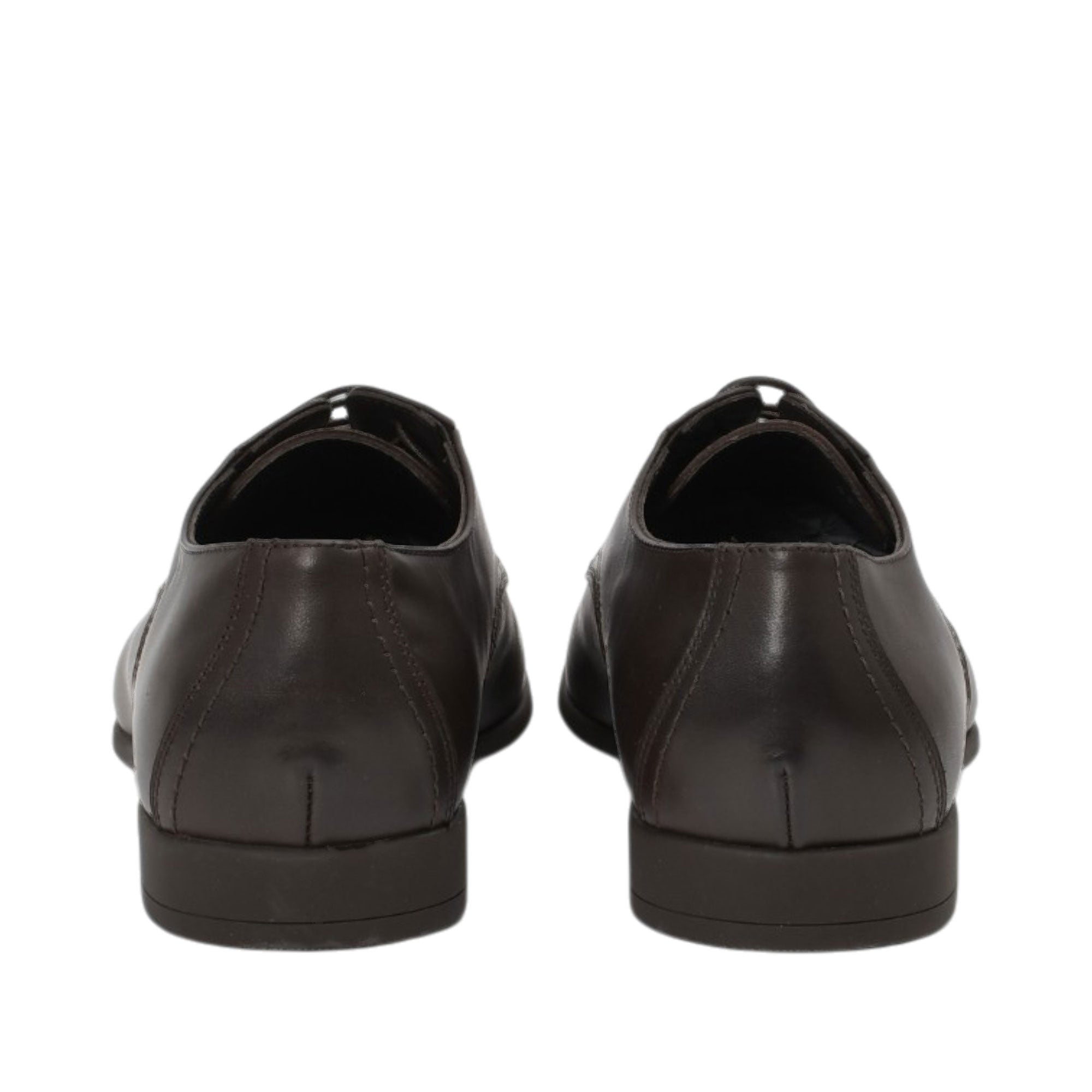 Rear view of a pair of Baldinini dark brown dress shoes showcasing the vertical heel seams, precise stitching, and thin, low-profile rubber heel bases against a white background.