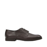 Profile view of a Baldinini dark brown leather Derby shoe showing its smooth matte upper, open-lacing structure with matching laces, and a sleek low block heel against a white background.