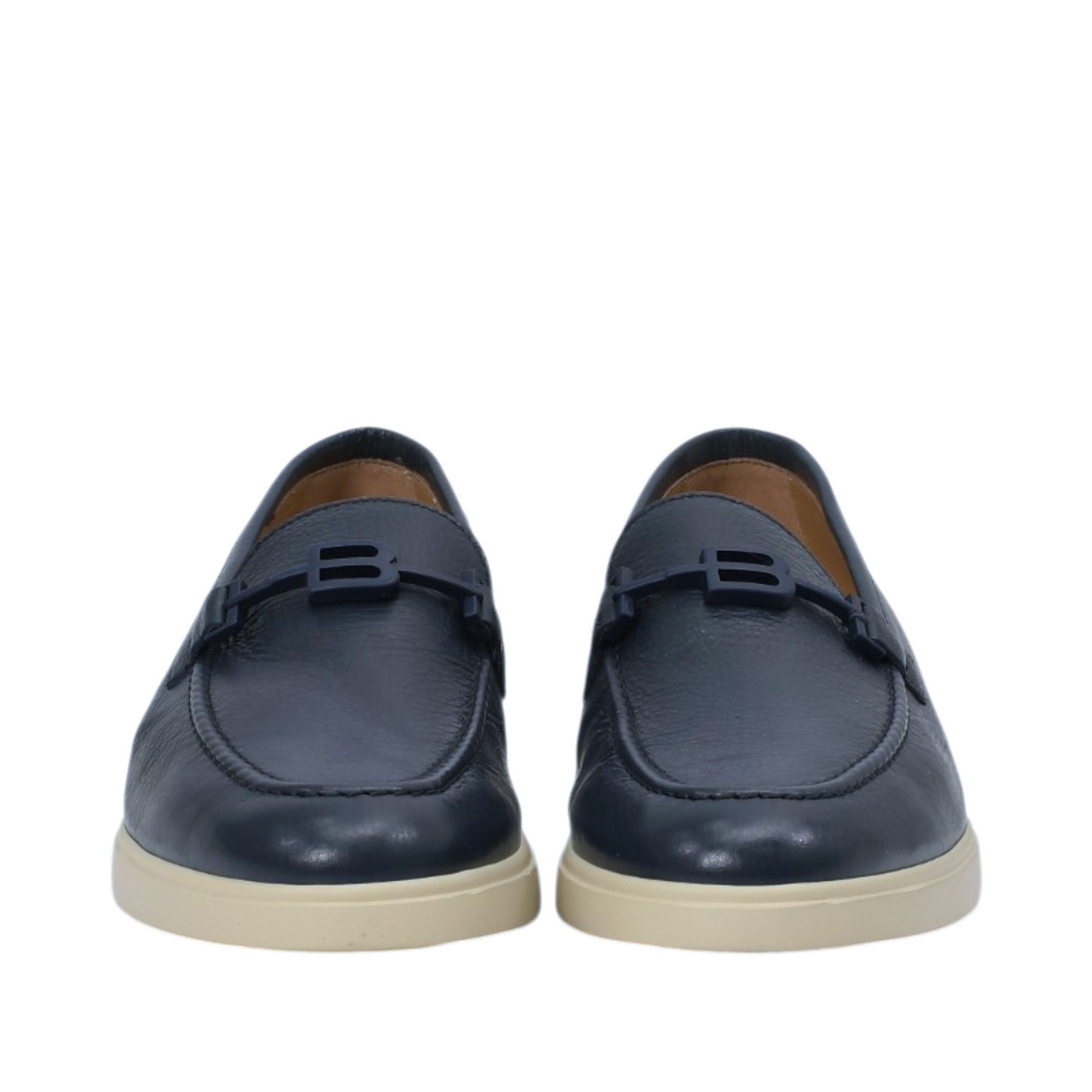 Front-facing view of a pair of Baldinini navy leather loafers, showcasing the symmetrical rounded toe boxes and the distinctive interlocking double-B logo hardware across the vamps against a white background.