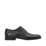 Profile view of a Baldinini black leather Derby dress shoe highlighting its low-top silhouette, elegant curved side stitching, miniature metal side logo, and low block heel against a white background.
